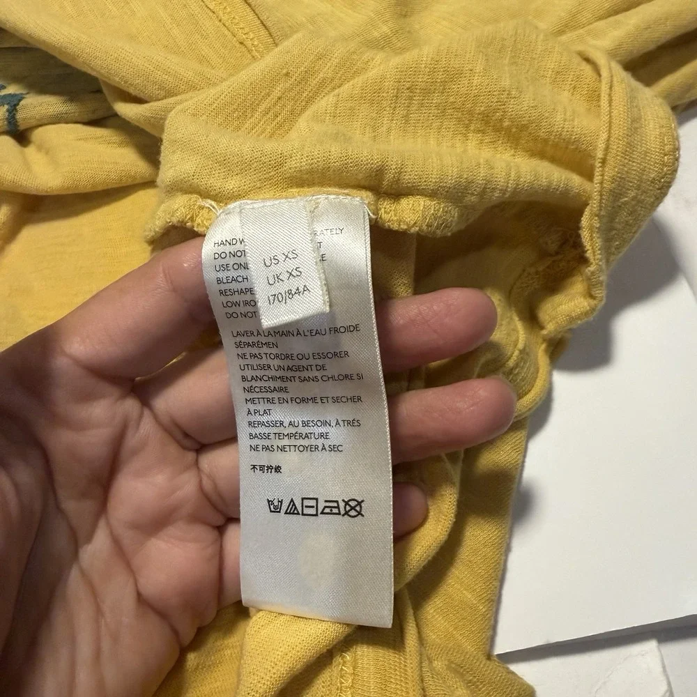 Free People Soak Up The Sun Yellow Eagle Embroidered Tee XS Boho Oversized
